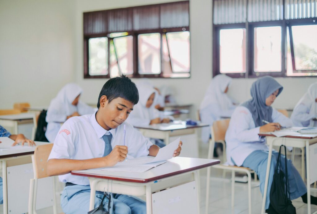 High school students in Indonesia studying in a classroom setting.